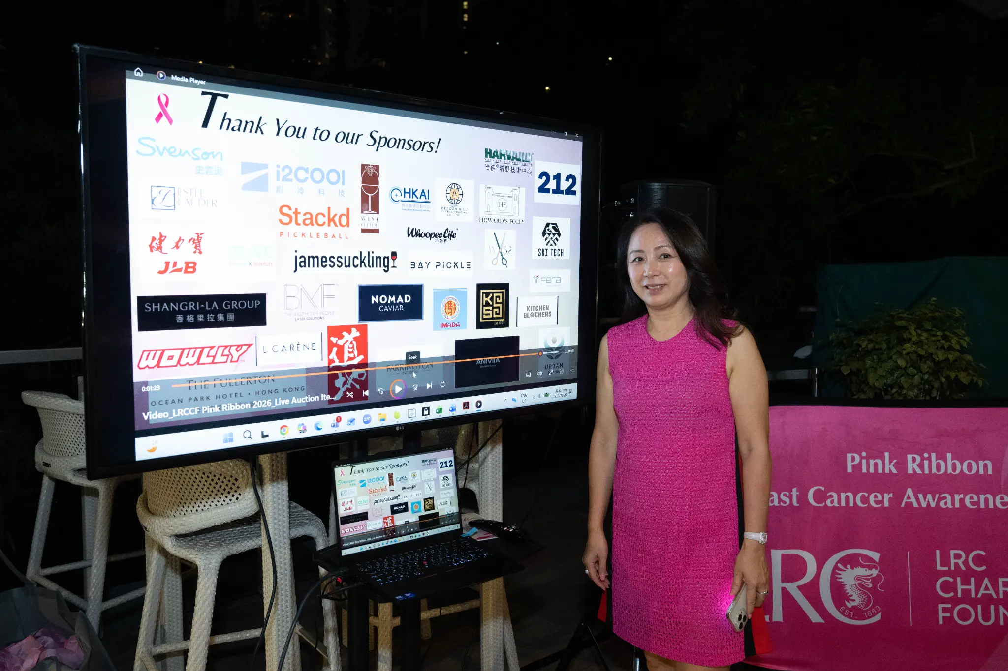 Owner-provided event photograph showing Pink Ribbon signage and a sponsor display.
