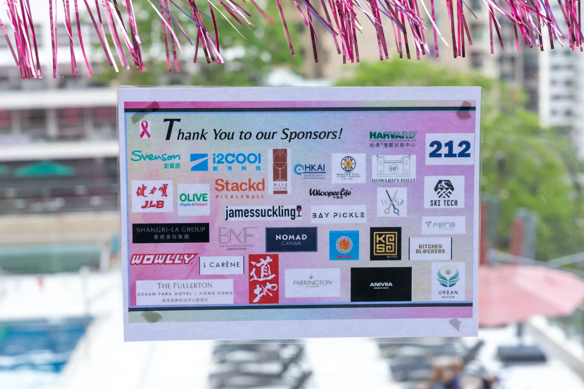 Owner-provided outdoor sponsor display for Pink Ribbon 2026 with WhoopeeLife visibly listed.