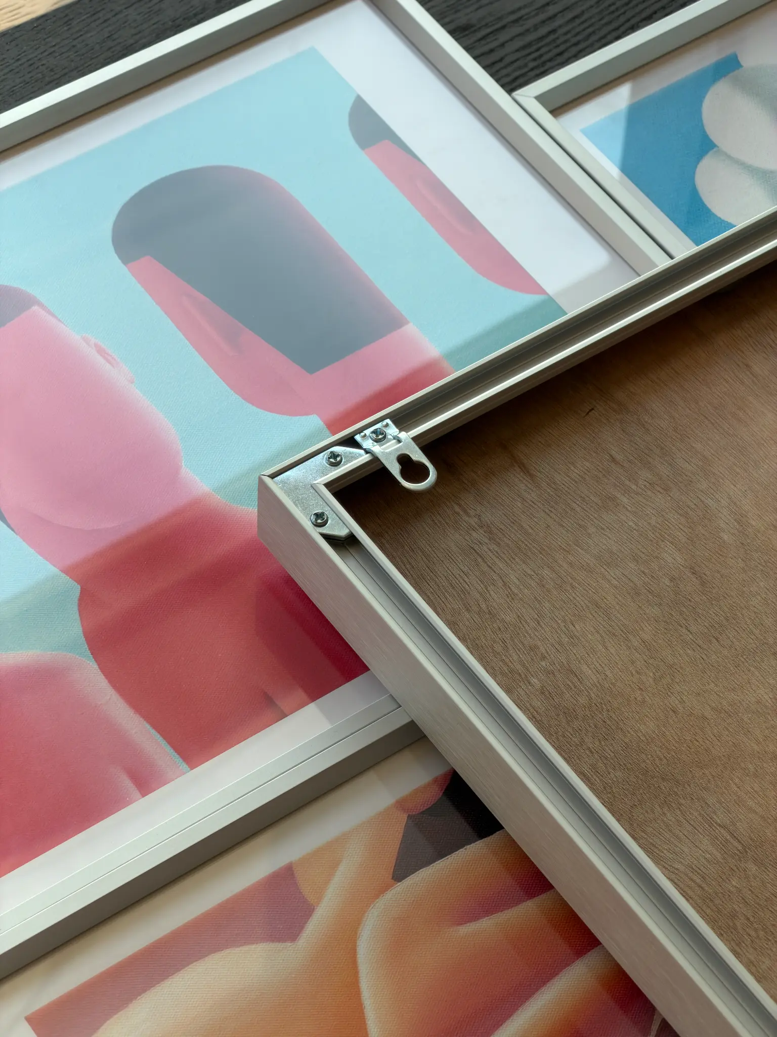 Reverse-side hanging hardware of the framed Wu Qiang giclée print edition